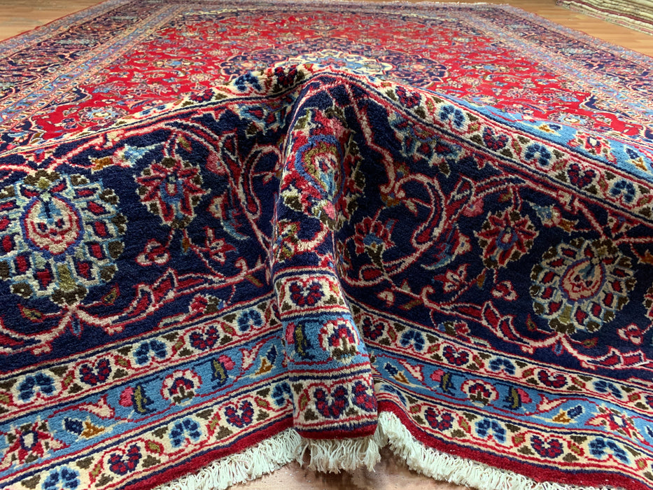 9’6” × 13’11” Handgeknoopt wollen Perzisch tapijt – Rood met marineblauwe rand en centraal medaillon