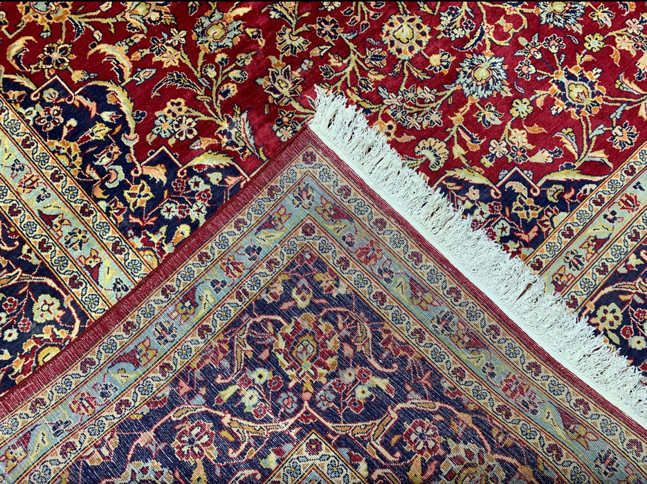 9'6" × 13'10" Handgeknoopt Perzisch wollen tapijt – Rood veld met marineblauwe & ivoorkleurige bloemenrand