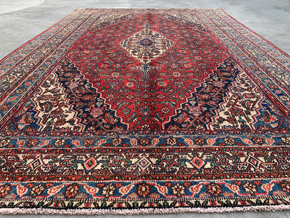 Handgemaakt Perzisch wollen vloerkleed 7x10 - Rood, blauw en ivoorkleurig traditioneel Perzisch kleed met geometrisch medaillon - Exacte afmetingen 10'5" x 7'0" - KBHM-1038