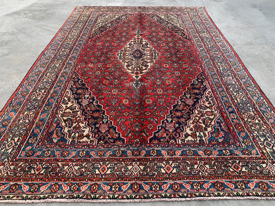 Handgemaakt Perzisch wollen vloerkleed 7x10 - Rood, blauw en ivoorkleurig traditioneel Perzisch kleed met geometrisch medaillon - Exacte afmetingen 10'5" x 7'0" - KBHM-1038