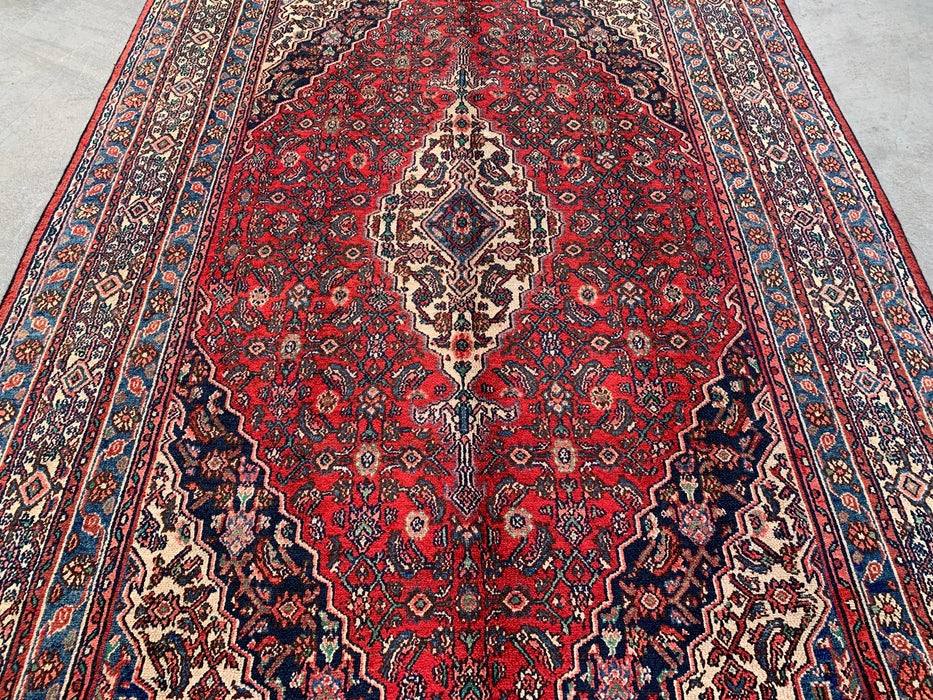 Handgemaakt Perzisch wollen vloerkleed 7x10 - Rood, blauw en ivoorkleurig traditioneel Perzisch kleed met geometrisch medaillon - Exacte afmetingen 10'5" x 7'0" - KBHM-1038