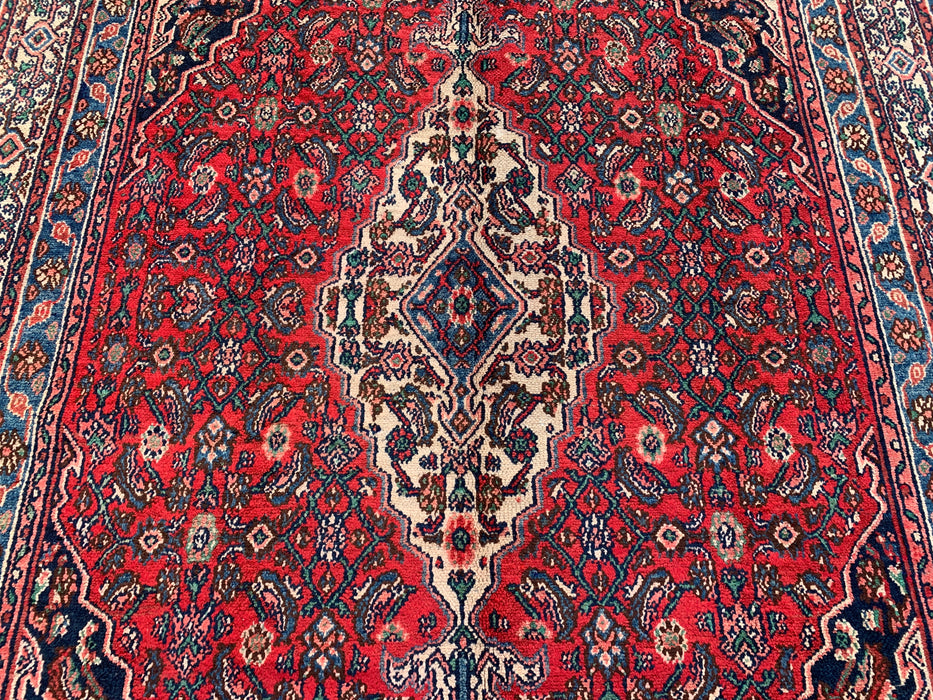 Handgemaakt Perzisch wollen vloerkleed 7x10 - Rood, blauw en ivoorkleurig traditioneel Perzisch kleed met geometrisch medaillon - Exacte afmetingen 10'5" x 7'0" - KBHM-1038