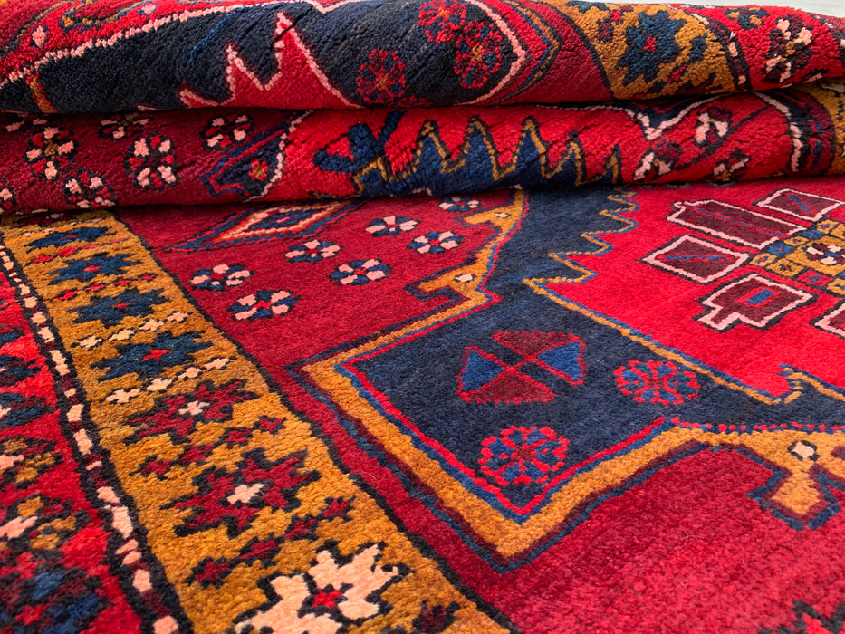 11'5 x 3'8 Handgeknoopt Perzisch wollen loperkleed in rood, marineblauw en goud met tribaal geometrisch medaillonontwerp | KBHM-1056