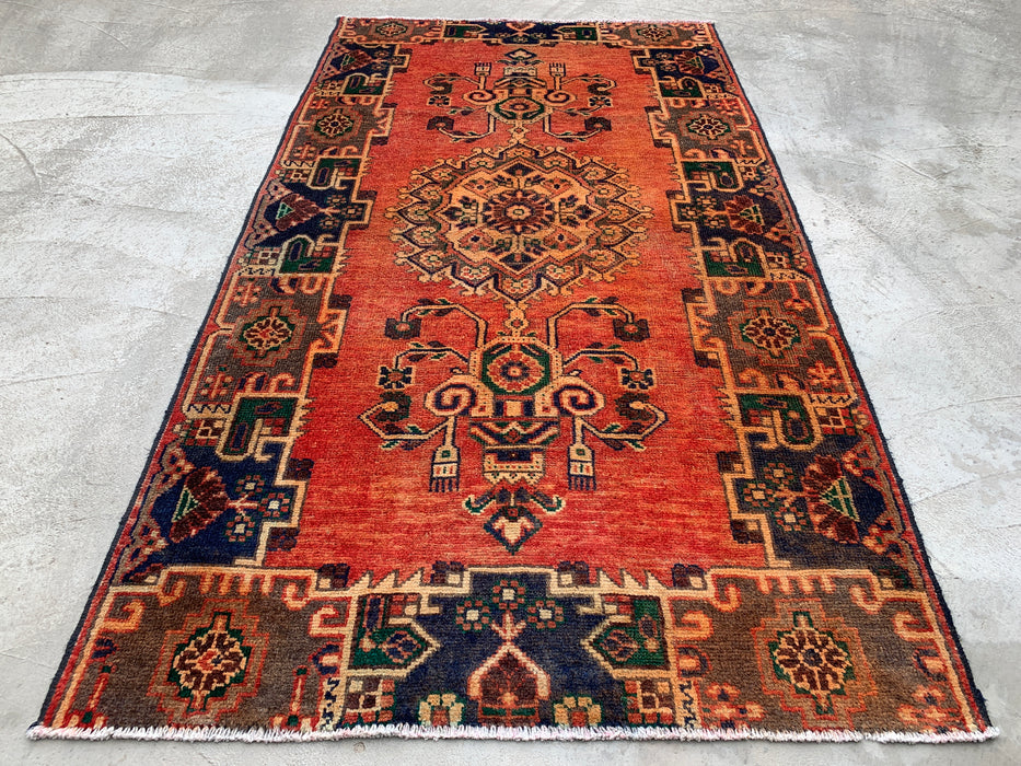 224 x 124 cm handgeknoopt Perzisch wollen tapijt in roest, marineblauw en olijfgroen met stam-geometrisch medaillonmotief | KBHM-1112