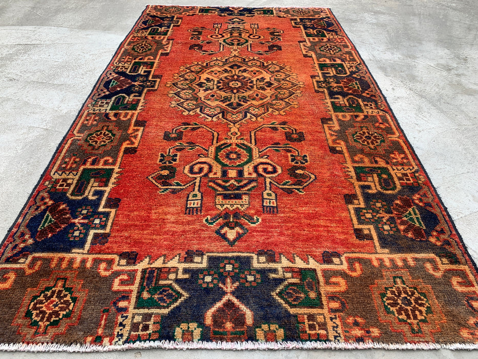 224 x 124 cm handgeknoopt Perzisch wollen tapijt in roest, marineblauw en olijfgroen met stam-geometrisch medaillonmotief | KBHM-1112