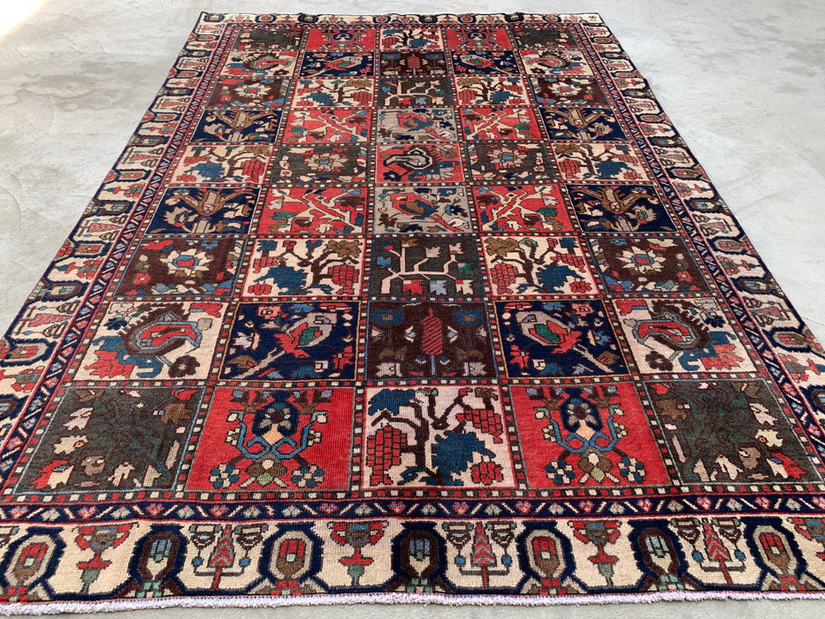 Handgemaakt Perzisch wollen vloerkleed 7x10 - Ivoor, marineblauw, rood & blauw traditioneel tuin-paneel Perzische stijl vloerkleed - Exacte afmeting 9'5" x 6'5" - KBHM-1131