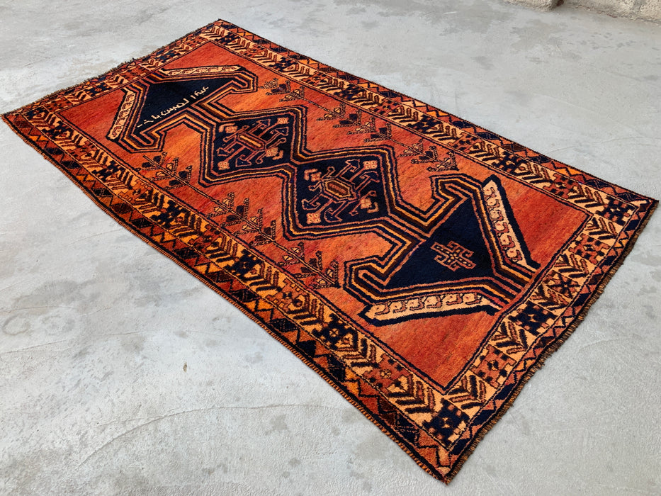 KBHM-1156 Handgeknoopt Perzisch wollen vloerkleed – 259 x 142 cm Roest, oranje & marineblauw tribaal geometrisch vloerkleed