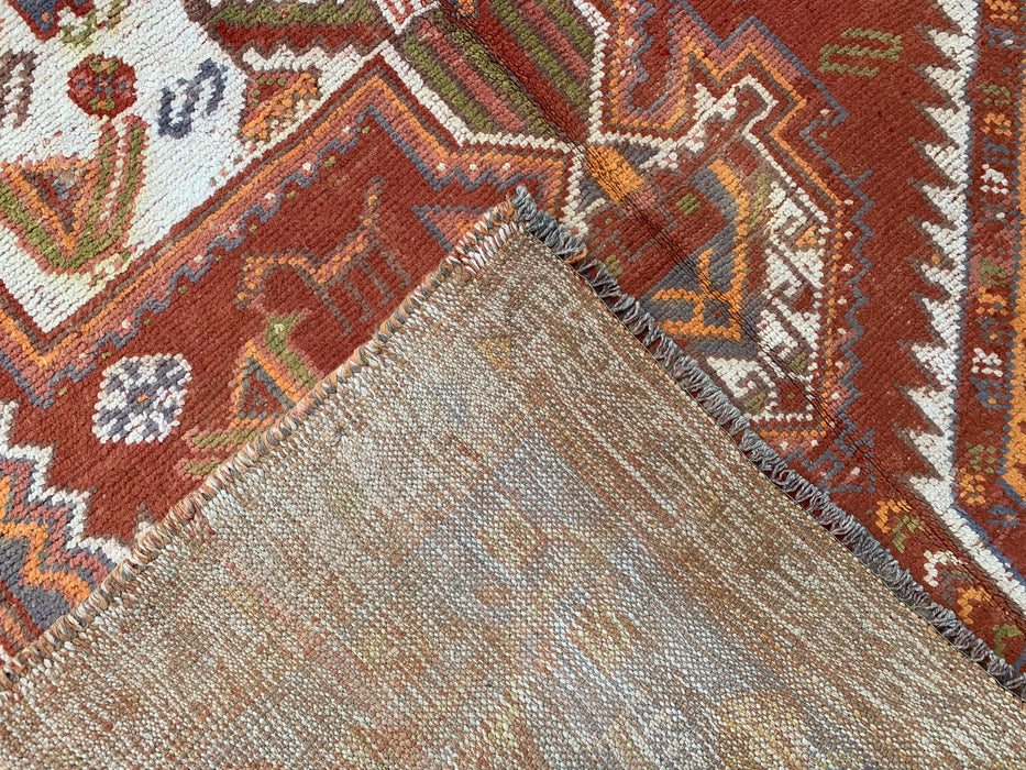Handgeknoopt Perzisch wollen vloerkleed 221 x 140 cm roestkleurig ivoor tribaal medaillonkleed KBHM-1161
