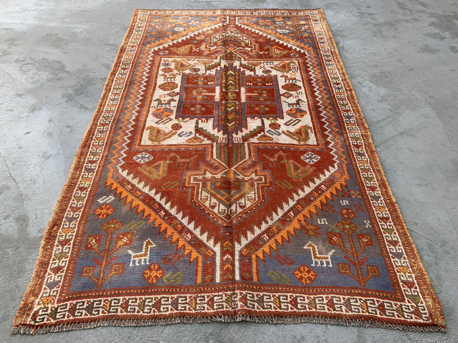 Handgeknoopt Perzisch wollen vloerkleed 221 x 140 cm roestkleurig ivoor tribaal medaillonkleed KBHM-1161