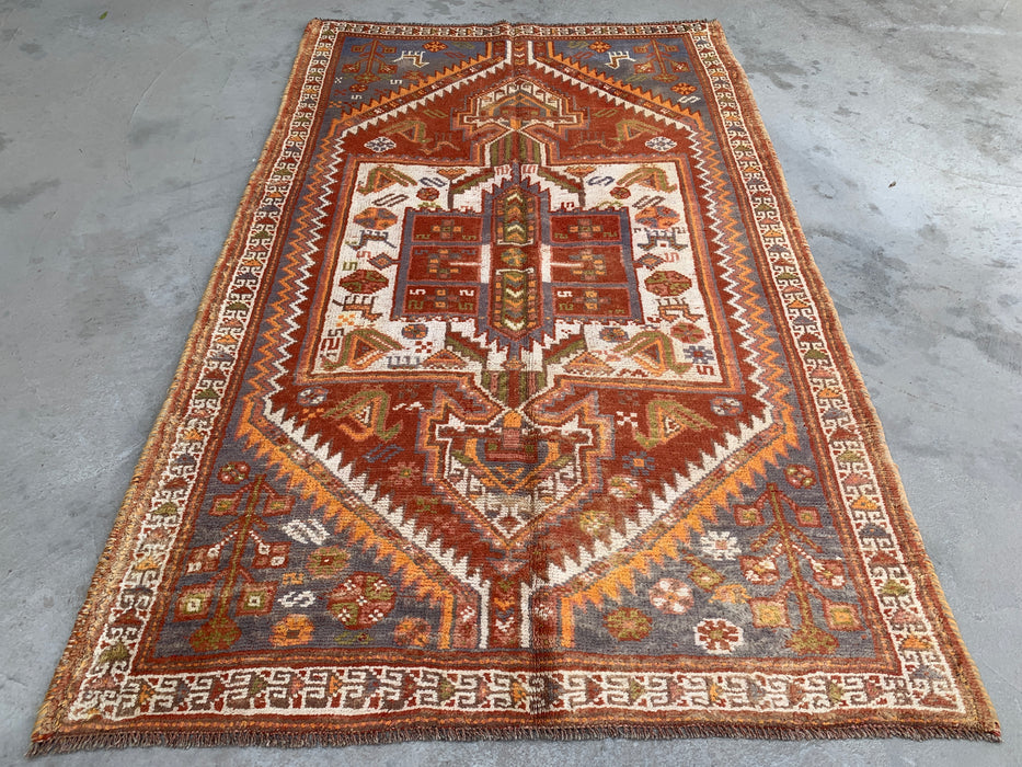 Handgeknoopt Perzisch wollen vloerkleed 221 x 140 cm roestkleurig ivoor tribaal medaillonkleed KBHM-1161