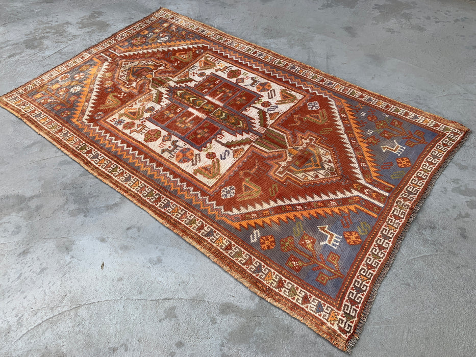 Handgeknoopt Perzisch wollen vloerkleed 221 x 140 cm roestkleurig ivoor tribaal medaillonkleed KBHM-1161