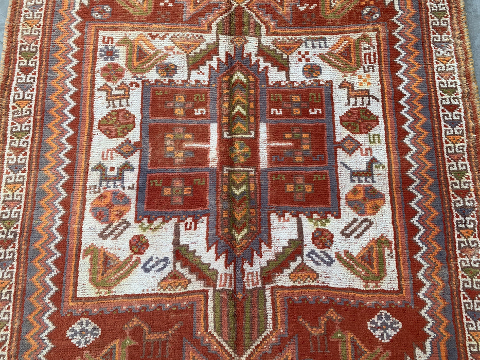 Handgeknoopt Perzisch wollen vloerkleed 221 x 140 cm roestkleurig ivoor tribaal medaillonkleed KBHM-1161