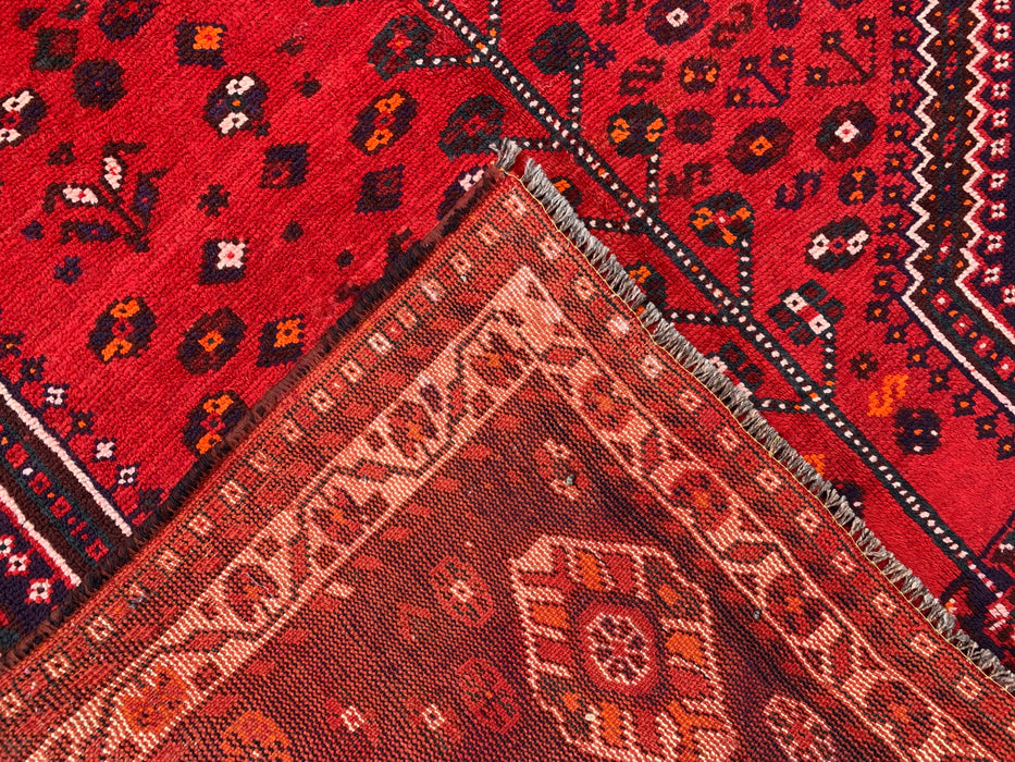 Handgeknoopt Perzisch wollen vloerkleed 241 x 145 cm rood/marineblauw tribaal karpet - KBHM-1170