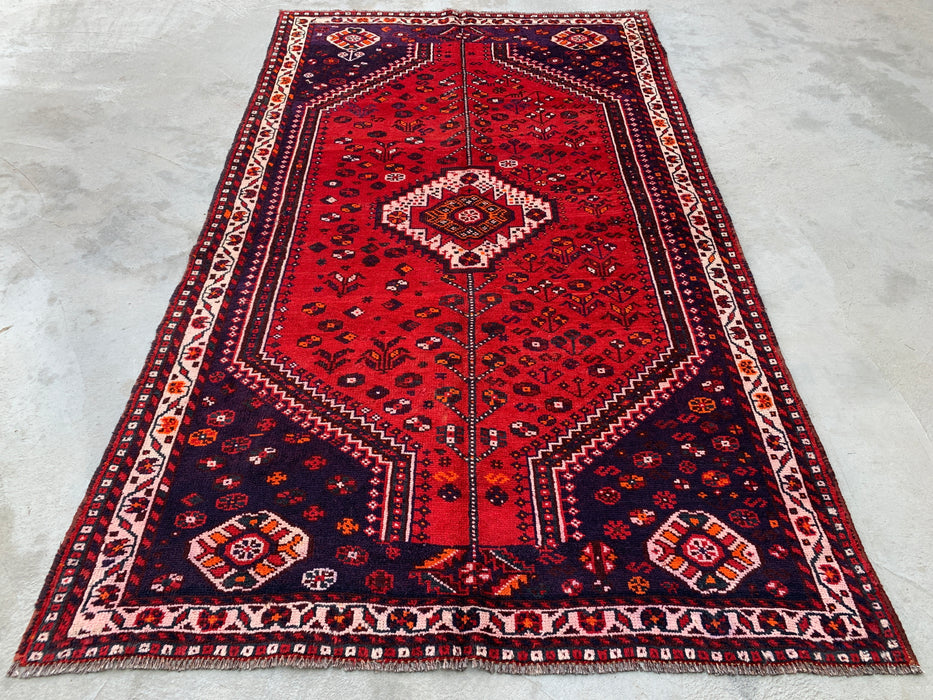 Handgeknoopt Perzisch wollen vloerkleed 241 x 145 cm rood/marineblauw tribaal karpet - KBHM-1170