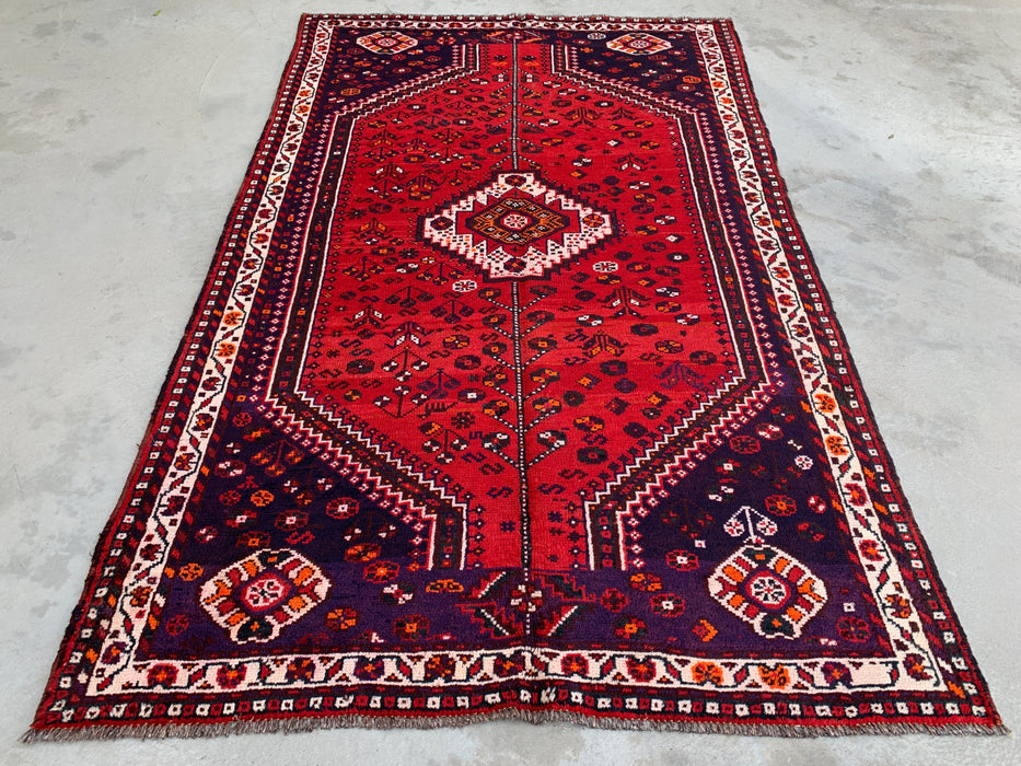 Handgeknoopt Perzisch wollen vloerkleed 241 x 145 cm rood/marineblauw tribaal karpet - KBHM-1170