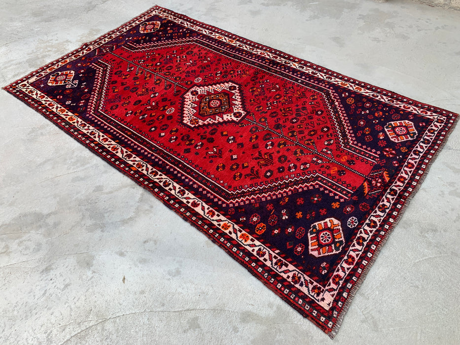 Handgeknoopt Perzisch wollen vloerkleed 241 x 145 cm rood/marineblauw tribaal karpet - KBHM-1170