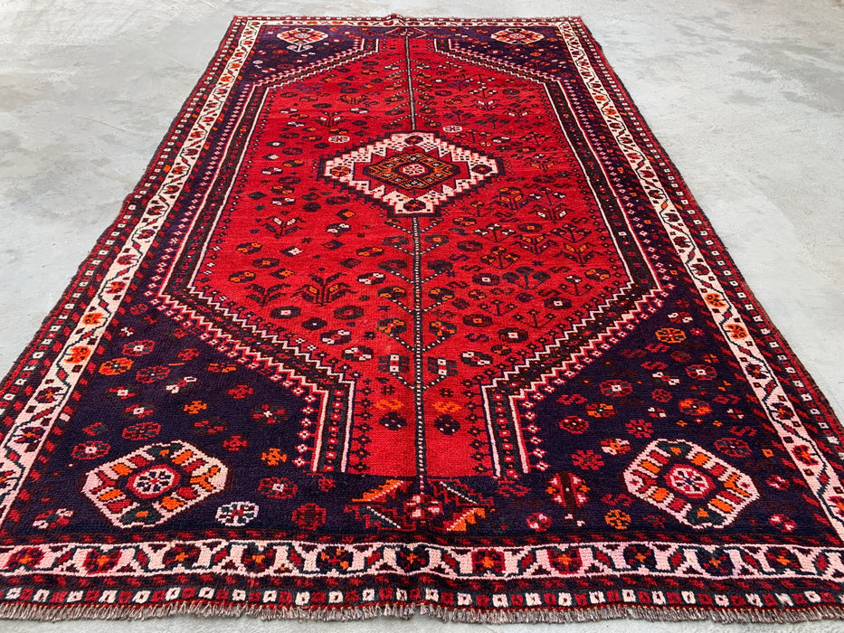 Handgeknoopt Perzisch wollen vloerkleed 241 x 145 cm rood/marineblauw tribaal karpet - KBHM-1170