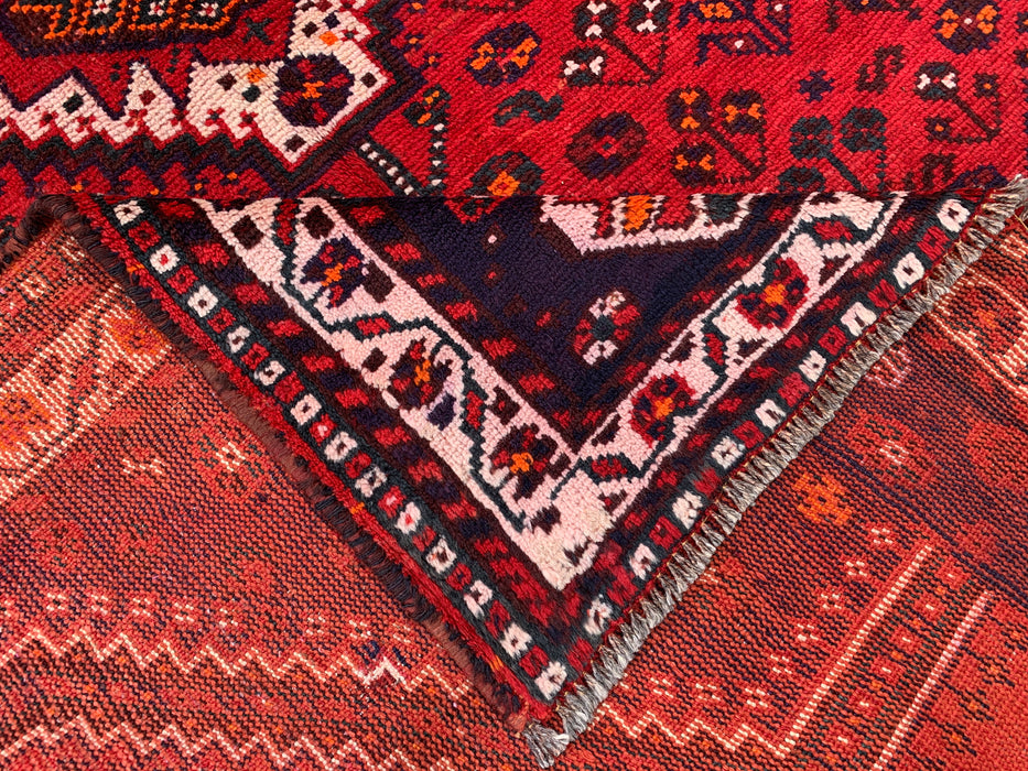 Handgeknoopt Perzisch wollen vloerkleed 241 x 145 cm rood/marineblauw tribaal karpet - KBHM-1170
