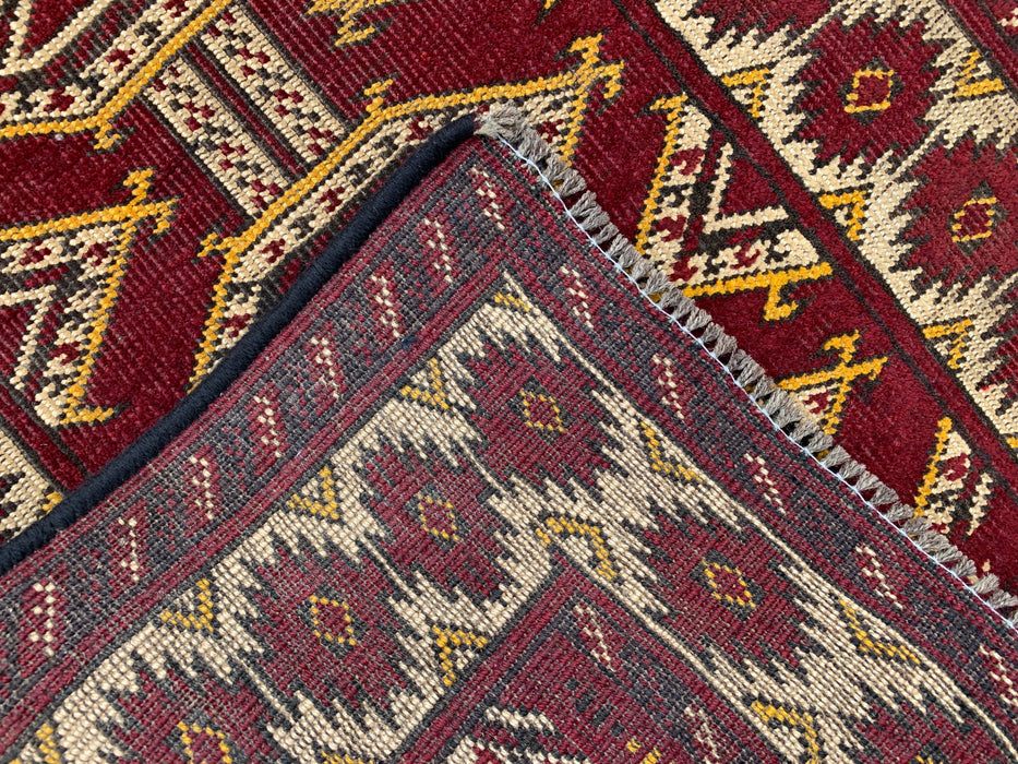 KBHM-1190 Handgeknoopt Perzisch wollen tapijt – 104 x 66 cm Rood, ivoor & zwart tribaal accentkleed