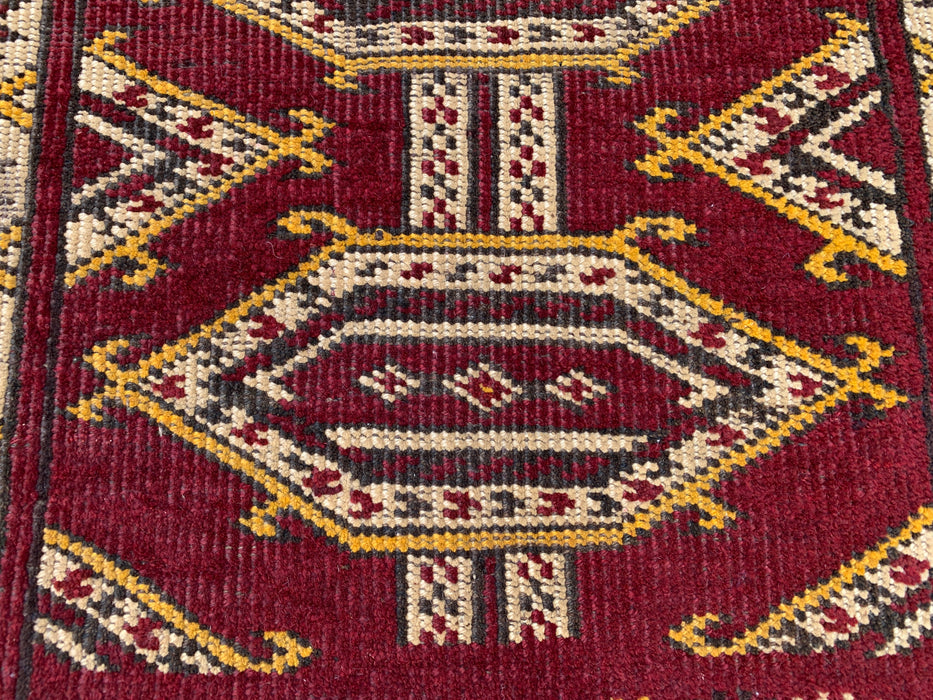 KBHM-1190 Handgeknoopt Perzisch wollen tapijt – 104 x 66 cm Rood, ivoor & zwart tribaal accentkleed