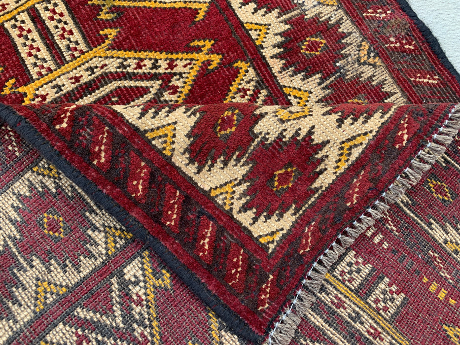 KBHM-1190 Handgeknoopt Perzisch wollen tapijt – 104 x 66 cm Rood, ivoor & zwart tribaal accentkleed
