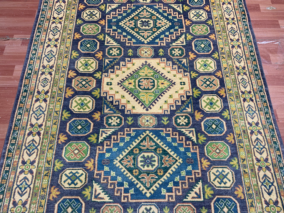 Handgeknoopt wollen tapijt van 150 × 208 cm – Geometrisch tribaal ontwerp in marineblauw & groen