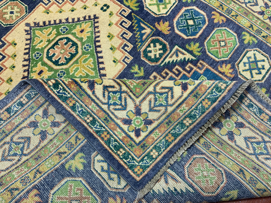 Handgeknoopt wollen tapijt van 150 × 208 cm – Geometrisch tribaal ontwerp in marineblauw & groen