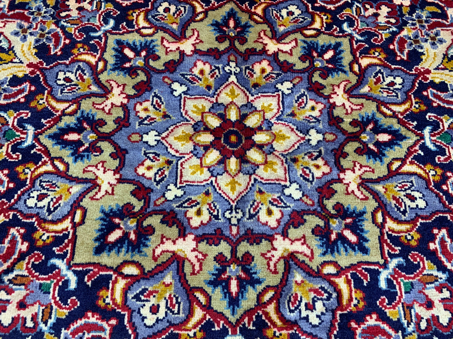 9'10" × 13'1" Hand-Knotted Wool Rug – Persian Red with Navy Floral Border