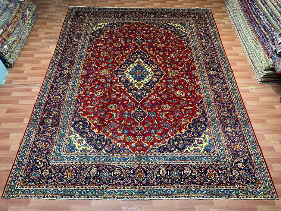 10'1" × 12'10" Handgeknoopt wollen vloerkleed – Perzisch rood medaillon met marineblauwe rand