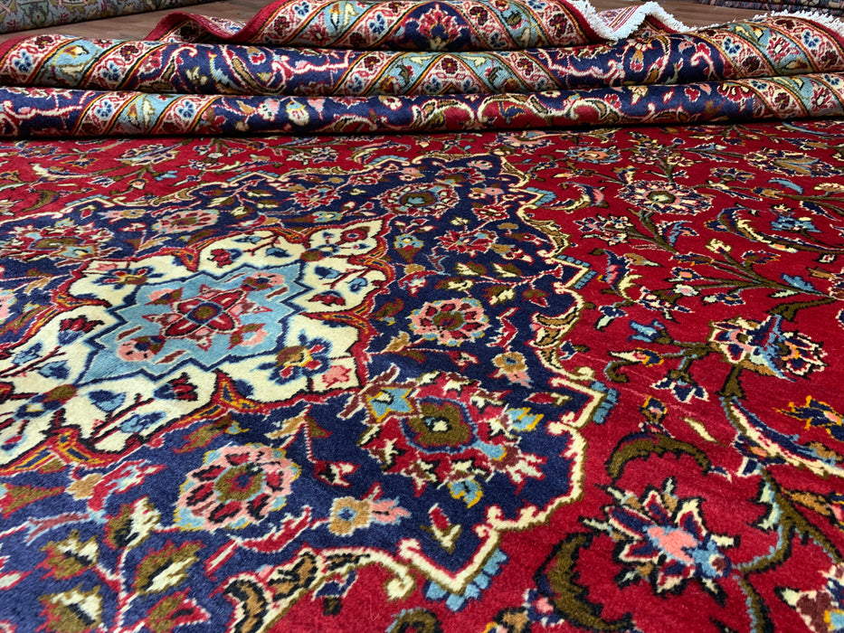 10'0" × 14'4" Handgeknoopt wollen tapijt – Rood medaillon met marineblauwe rand