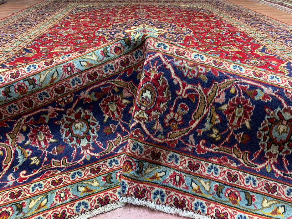 10'0" × 14'4" Handgeknoopt wollen tapijt – Rood medaillon met marineblauwe rand