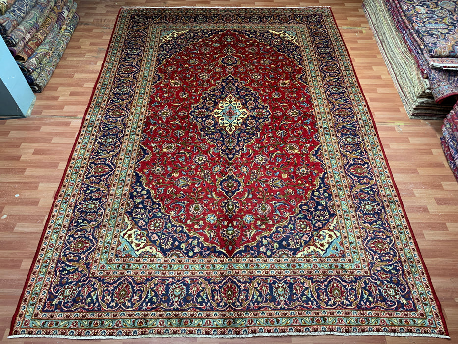 10'0" × 14'4" Handgeknoopt wollen tapijt – Rood medaillon met marineblauwe rand