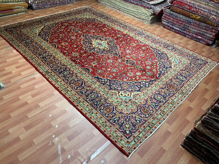 10'0" × 14'4" Handgeknoopt wollen tapijt – Rood medaillon met marineblauwe rand
