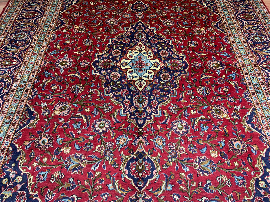 10'0" × 14'4" Handgeknoopt wollen tapijt – Rood medaillon met marineblauwe rand