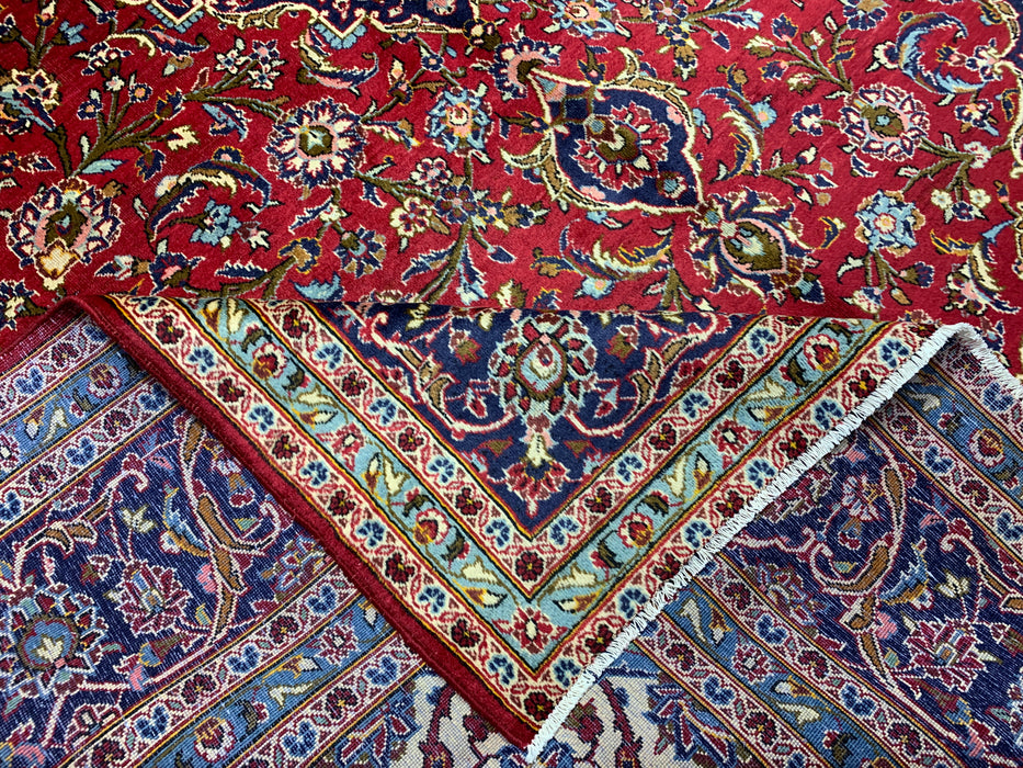 10'0" × 14'4" Handgeknoopt wollen tapijt – Rood medaillon met marineblauwe rand