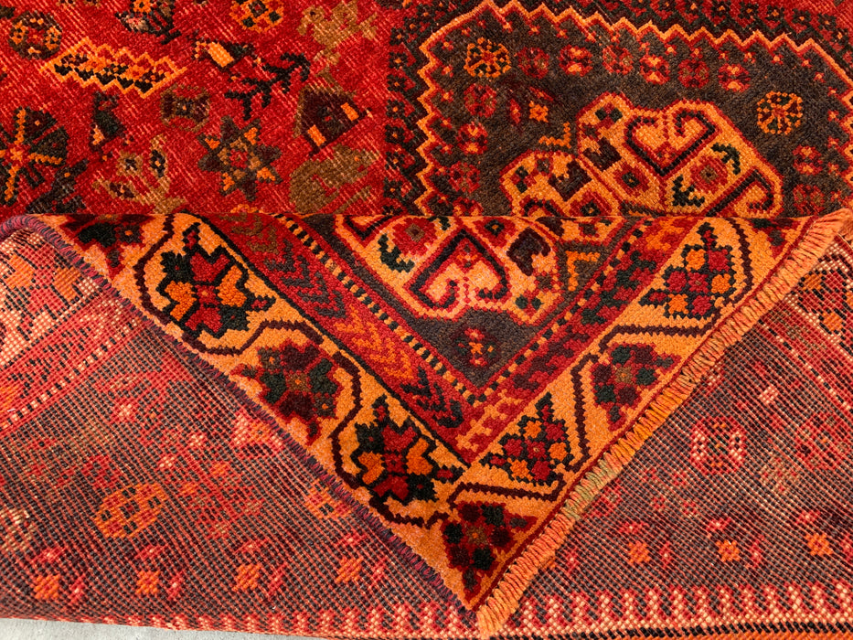 Handgemaakt Perzisch wollen vloerkleed 7x10 - Rood Perzisch tapijt in tribale medaillonstijl - Exacte afmetingen 277 cm x 180 cm - KBHM-652