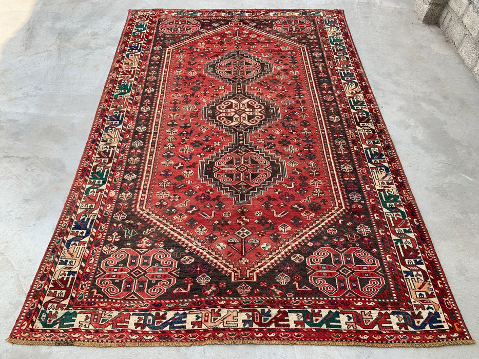 Handgemaakt Perzisch wollen vloerkleed 7x10 - Rood Perzisch tapijt met tribaal medaillon - Exacte afmeting 10'7" x 7'2" - KBHM-661