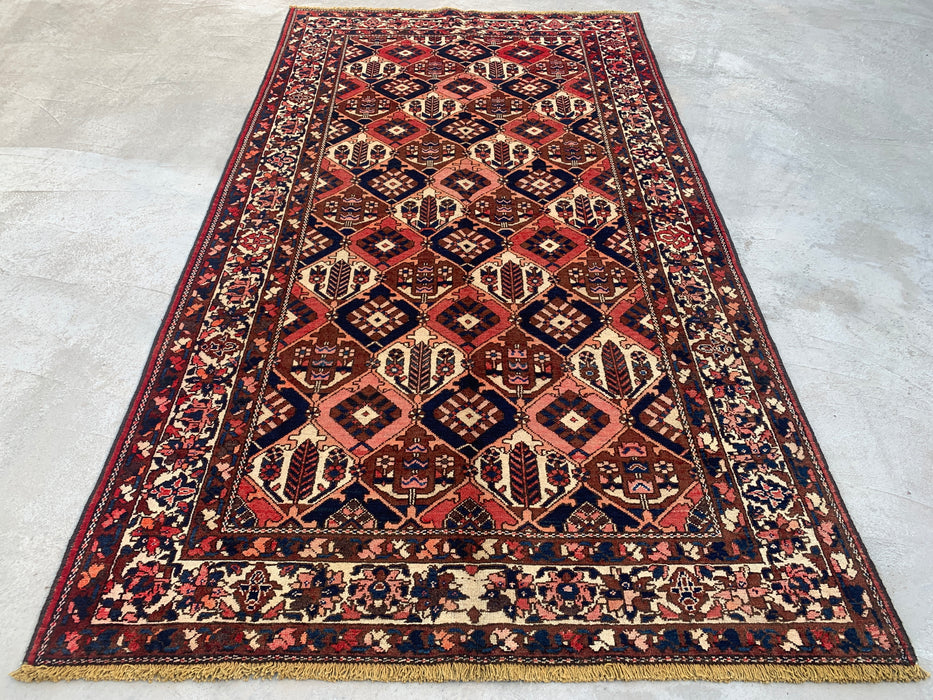 Handgemaakt Perzisch wollen vloerkleed 213x305 cm - Roest, marineblauw & ivoor tribaal geometrisch Perzisch stijl kleed - Exacte afmeting 299,7 cm x 157,5 cm - KBHM-694
