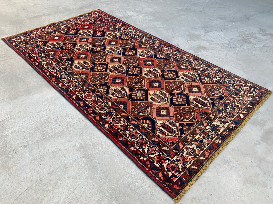 Handgemaakt Perzisch wollen vloerkleed 213x305 cm - Roest, marineblauw & ivoor tribaal geometrisch Perzisch stijl kleed - Exacte afmeting 299,7 cm x 157,5 cm - KBHM-694