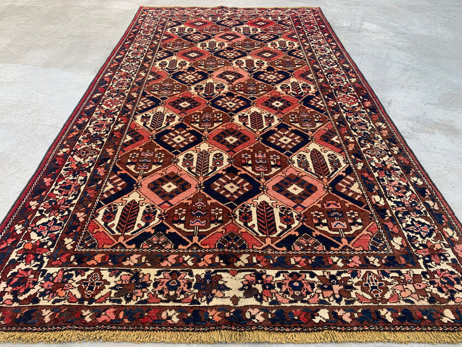 Handgemaakt Perzisch wollen vloerkleed 213x305 cm - Roest, marineblauw & ivoor tribaal geometrisch Perzisch stijl kleed - Exacte afmeting 299,7 cm x 157,5 cm - KBHM-694