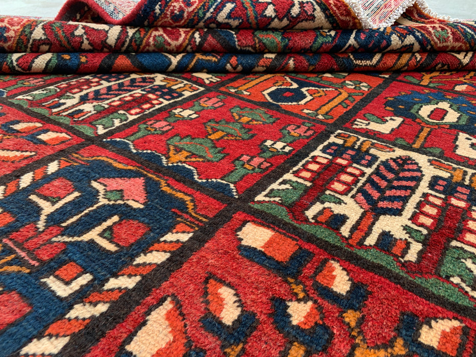 Handgemaakt Perzisch wollen karpet 213x305 - Rood, marineblauw en ivoorkleurig Perzisch tapijt met tribaal patroon - Exacte afmetingen 292 cm x 208 cm - KBHM-700