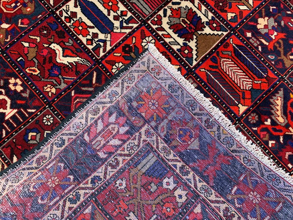 Handgemaakt Perzisch wollen vloerkleed 7x10 - Rood, marineblauw & ivoorkleurig Perzisch tapijt in tribale stijl met panelen - Exacte maat 10'0" x 7'0" - KBHM-707