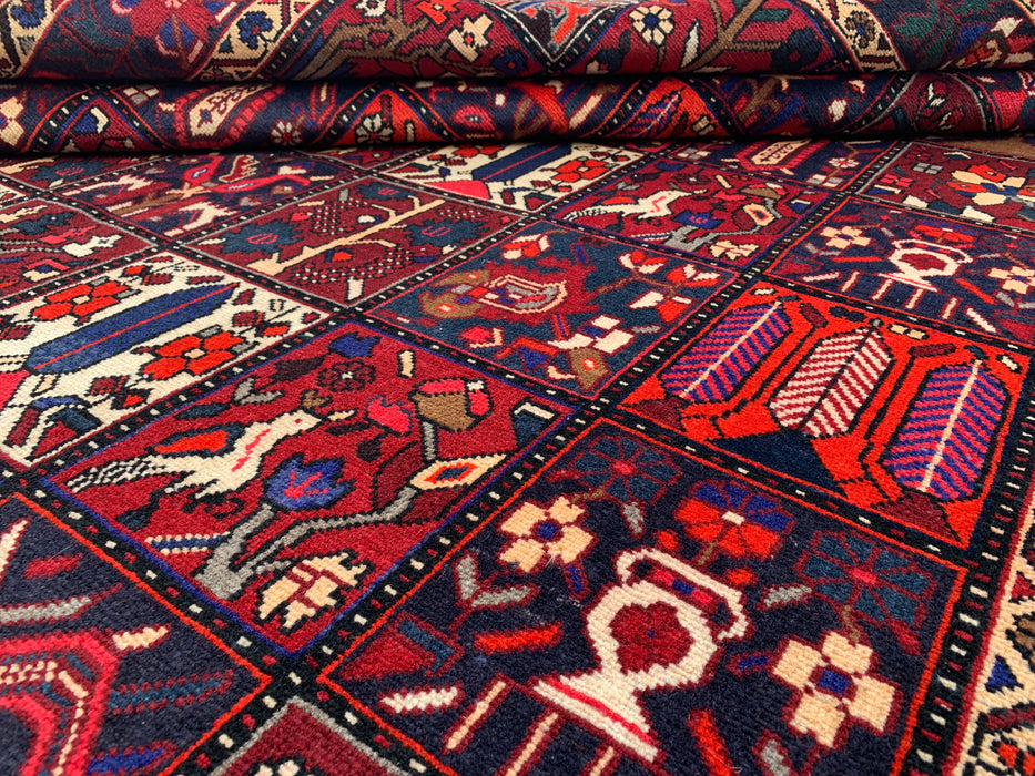 Handgemaakt Perzisch wollen vloerkleed 7x10 - Rood, marineblauw & ivoorkleurig Perzisch tapijt in tribale stijl met panelen - Exacte maat 10'0" x 7'0" - KBHM-707