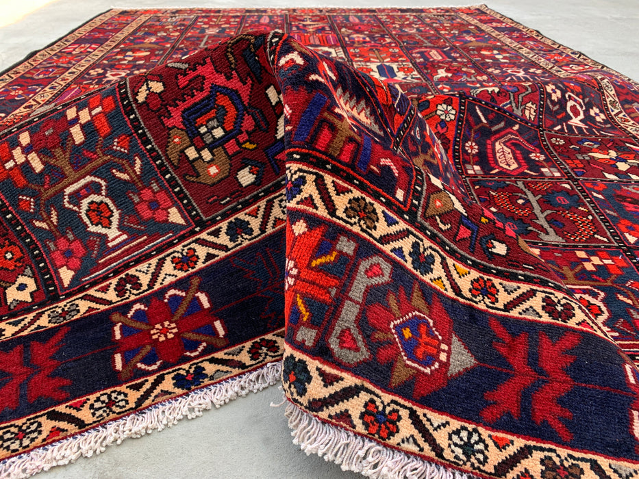 Handgemaakt Perzisch wollen vloerkleed 7x10 - Rood, marineblauw & ivoorkleurig Perzisch tapijt in tribale stijl met panelen - Exacte maat 10'0" x 7'0" - KBHM-707