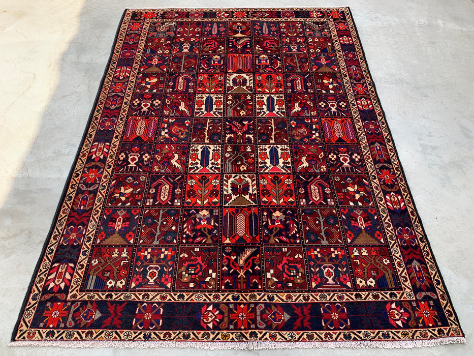 Handgemaakt Perzisch wollen vloerkleed 7x10 - Rood, marineblauw & ivoorkleurig Perzisch tapijt in tribale stijl met panelen - Exacte maat 10'0" x 7'0" - KBHM-707