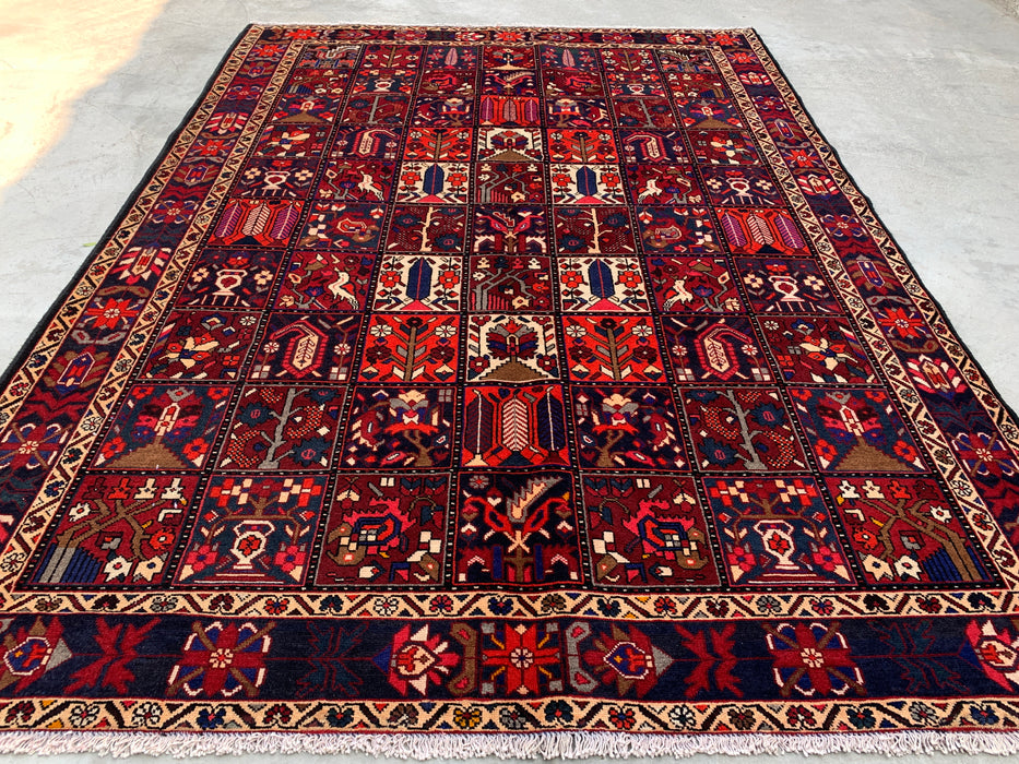 Handgemaakt Perzisch wollen vloerkleed 7x10 - Rood, marineblauw & ivoorkleurig Perzisch tapijt in tribale stijl met panelen - Exacte maat 10'0" x 7'0" - KBHM-707