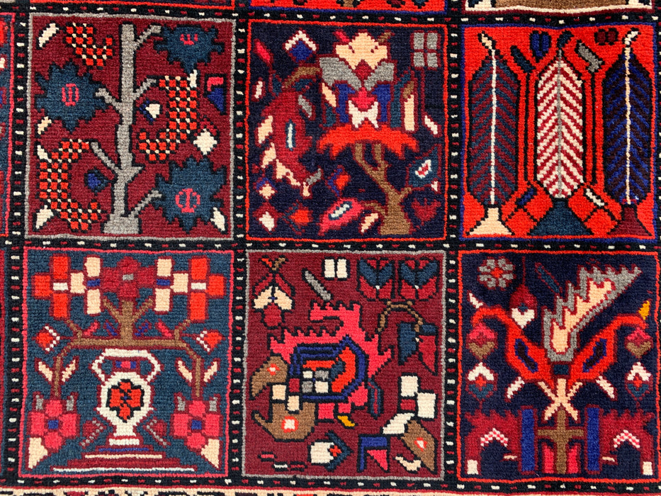 Handgemaakt Perzisch wollen vloerkleed 7x10 - Rood, marineblauw & ivoorkleurig Perzisch tapijt in tribale stijl met panelen - Exacte maat 10'0" x 7'0" - KBHM-707