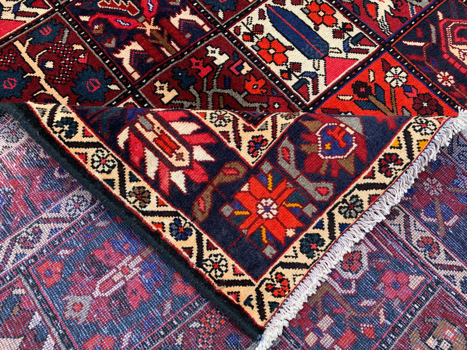 Handgemaakt Perzisch wollen vloerkleed 7x10 - Rood, marineblauw & ivoorkleurig Perzisch tapijt in tribale stijl met panelen - Exacte maat 10'0" x 7'0" - KBHM-707