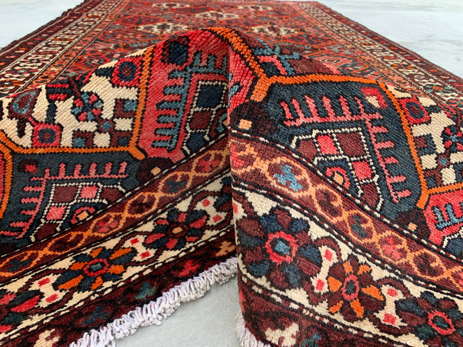 Handgemaakt Perzisch wollen vloerkleed 7x10 - Rood geometrisch tribaal Perzisch stijl kleed met ivoorkleurige rand - Exacte afmeting 9'10" x 5'3" - KBHM-835