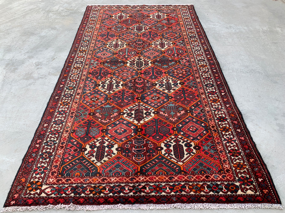 Handgemaakt Perzisch wollen vloerkleed 7x10 - Rood geometrisch tribaal Perzisch stijl kleed met ivoorkleurige rand - Exacte afmeting 9'10" x 5'3" - KBHM-835